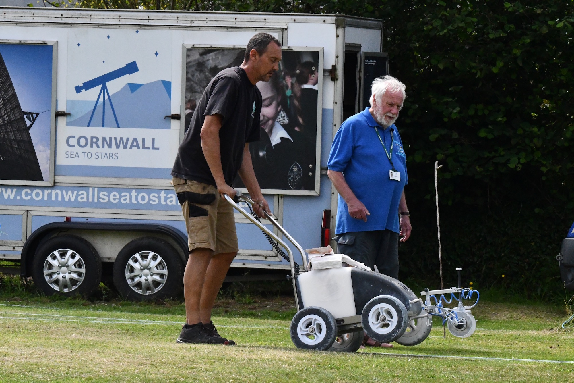 Marking out the Earth Story Trail in Willow Field on Wednesday 19 July 2023. 