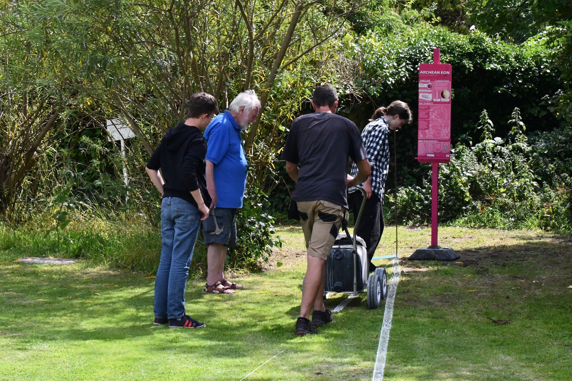 Marking out the Earth Story Trail in Willow Field on Wednesday 19 July 2023. 